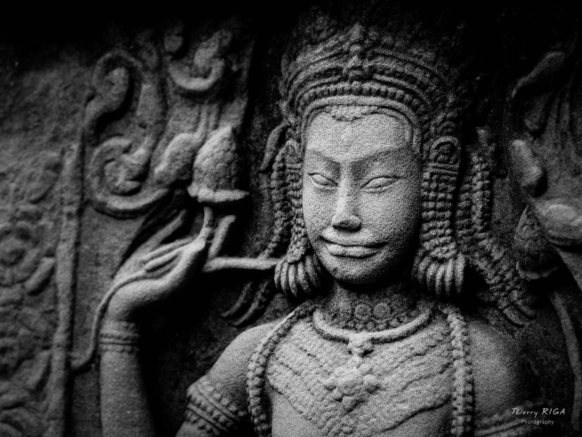 Devata carving in one of the temples of Angkor, Thierry Riga, Angkor Photography