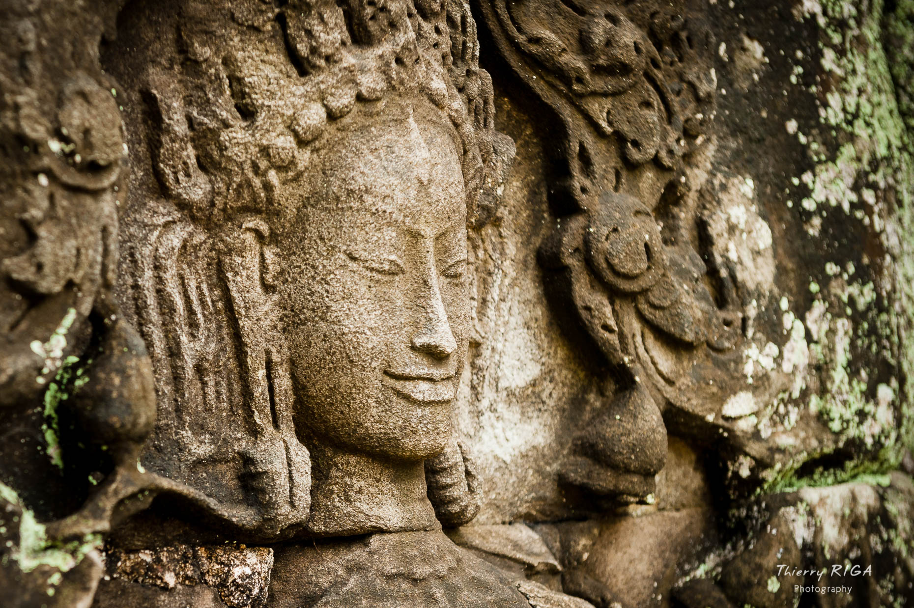 Devata carving face detail somewhere around Angkor, Thierry Riga, Angkor Photography