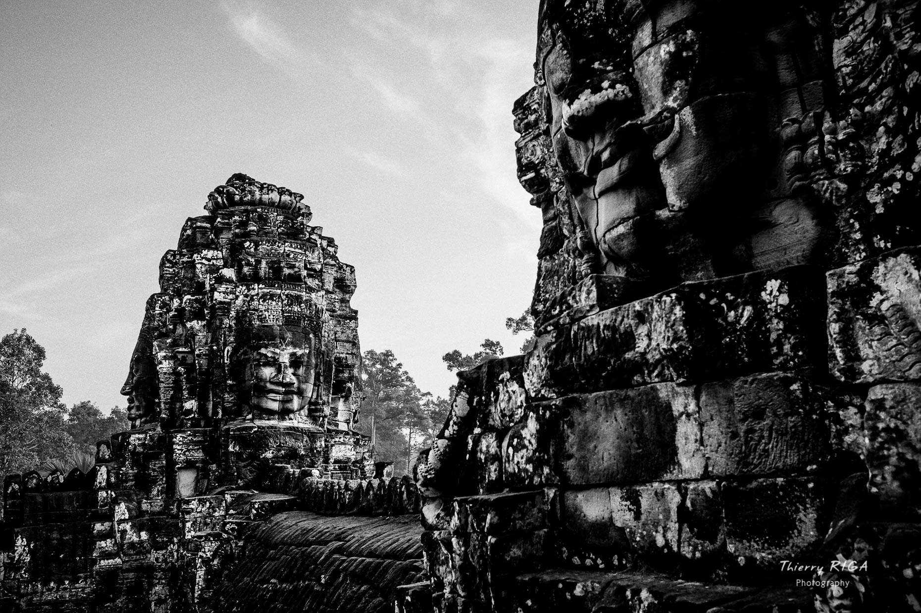 black and white vision of the Bayon face towers, Thierry Riga, Angkor Photography