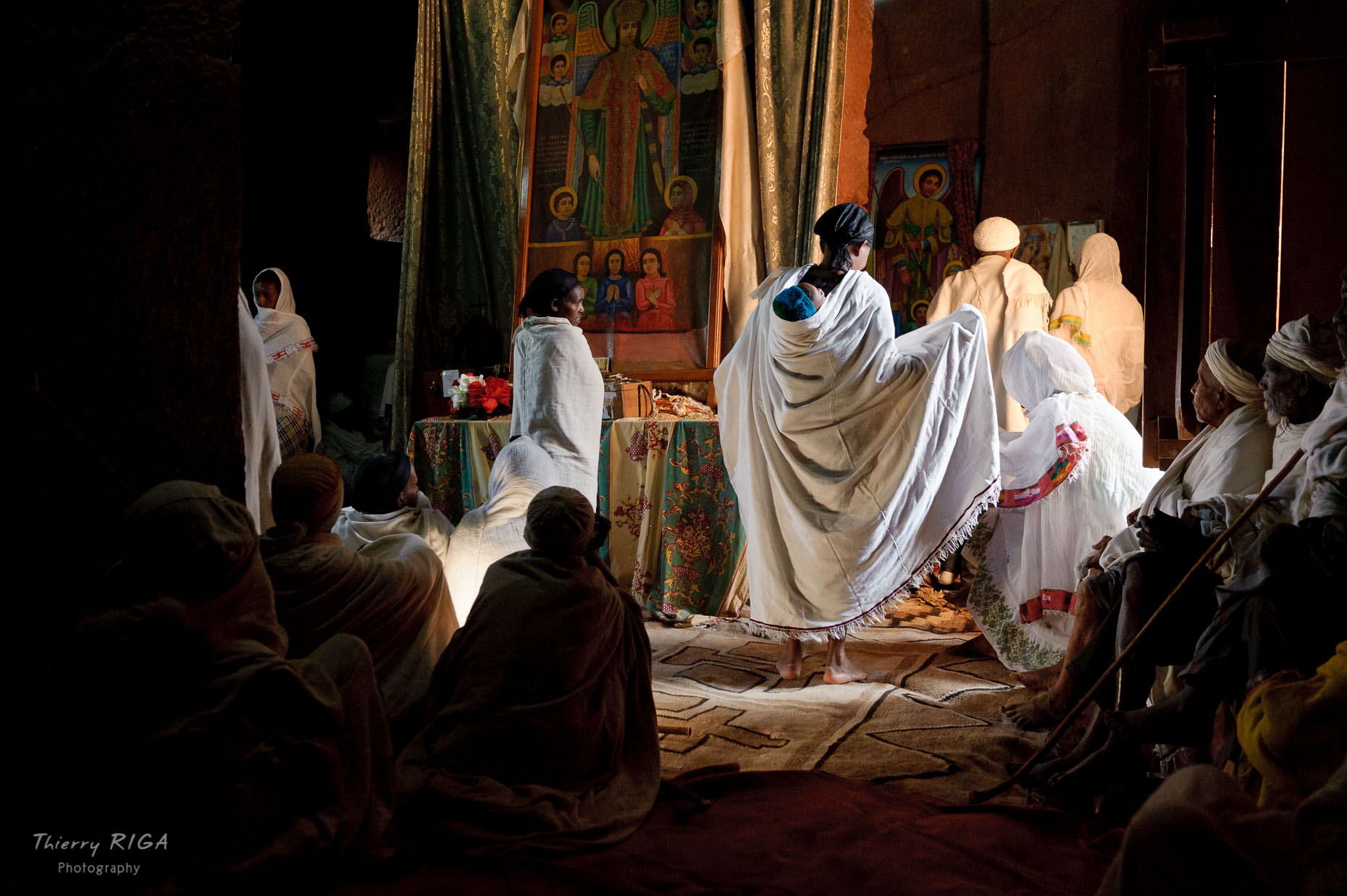 Women prying during Mass celebration in Gabriel Raphael church in Lalibela