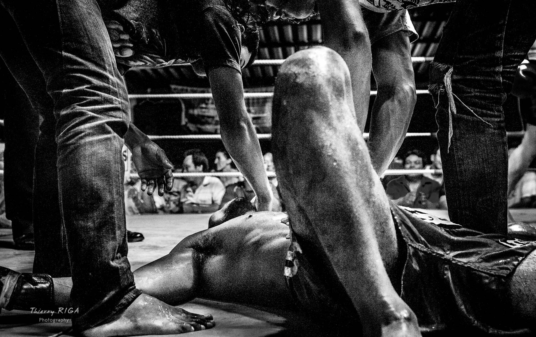 Boxer lying down after KO, Muay Thai boxing, Thailand