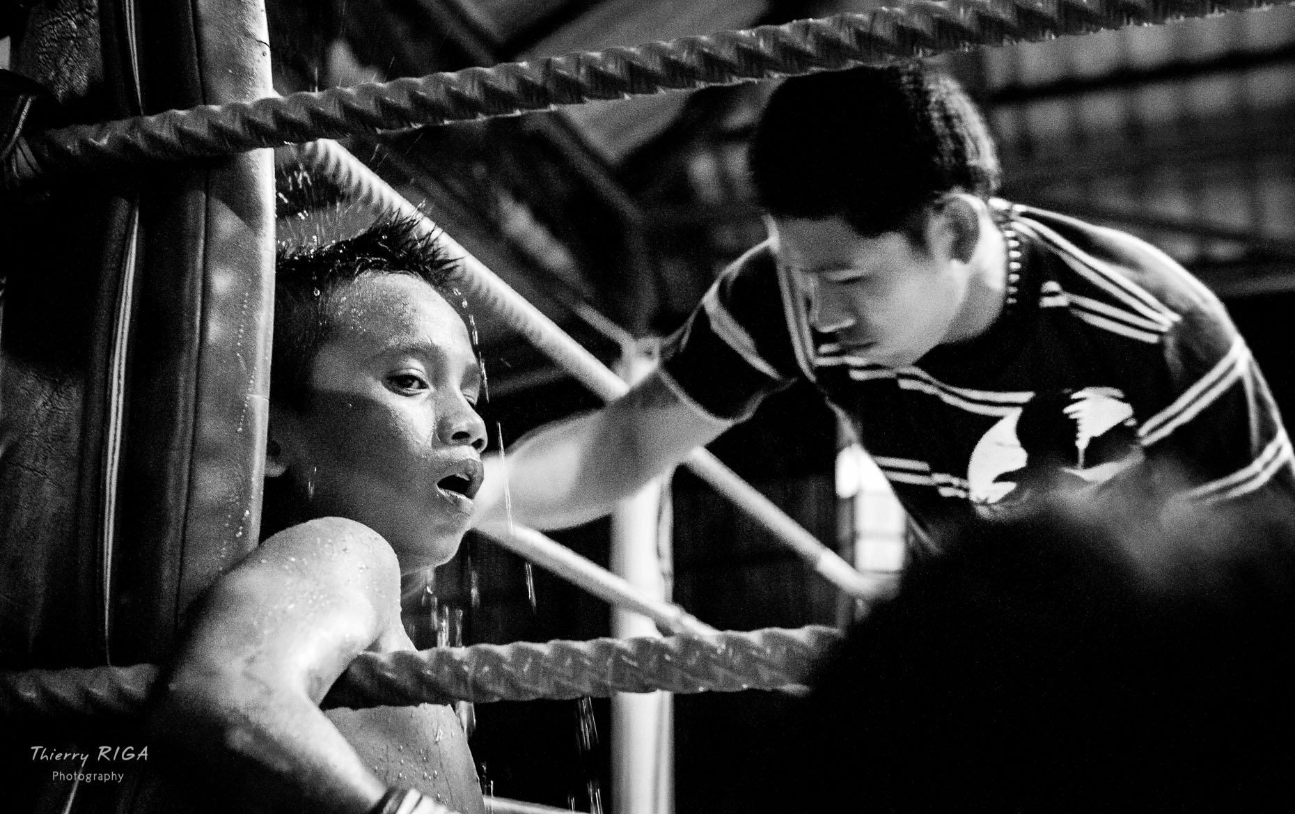 Muay Thai boxing portrait resting between rounds